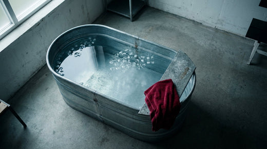 Team ice bath tub from above in a recovery room - hidden bacterial risks of shared cold plunge pools in rugby