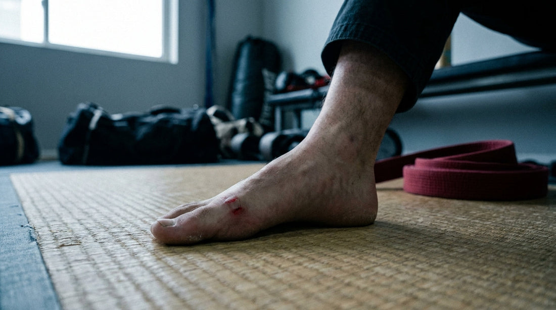 Mat burn on the top of a grappler's foot on a tatami training mat