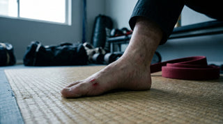 Mat burn on the top of a grappler's foot on a tatami training mat