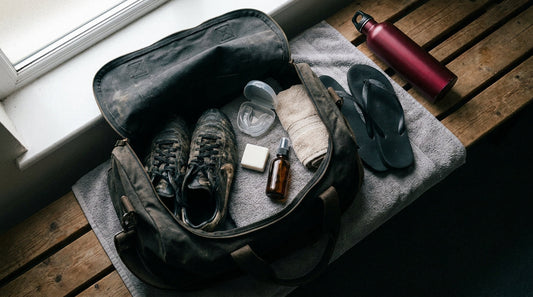 Rugby kit bag contents laid out on a bench - the ultimate player hygiene checklist for every kit bag