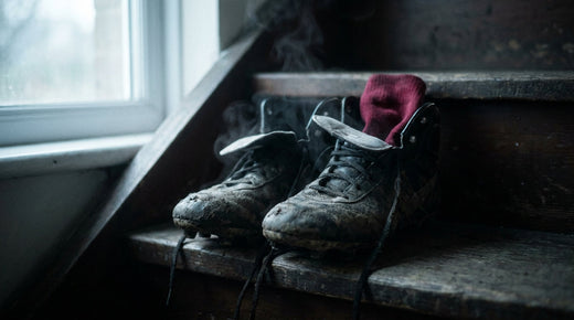 Muddy rugby boots airing open on a back step after training - how to remove boot odour permanently