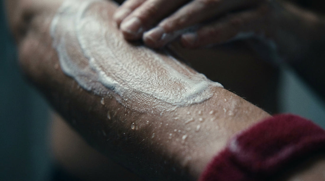 Close-up of creamy non-stripping soap lather on a forearm